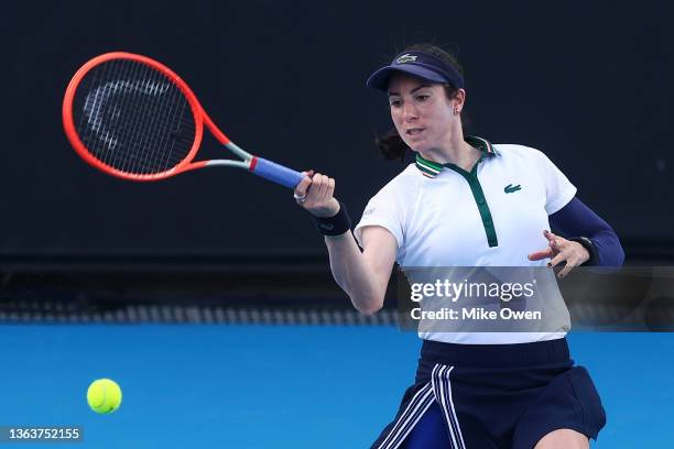 Christina McHale of the United States plays a forehand in her Woman's Singles match against Ellen Perez of Australia during day one of 2022...