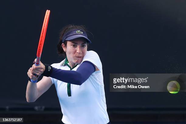Christina McHale of the United States plays a backhand in her Woman's Singles match against Ellen Perez of Australia during day one of 2022...
