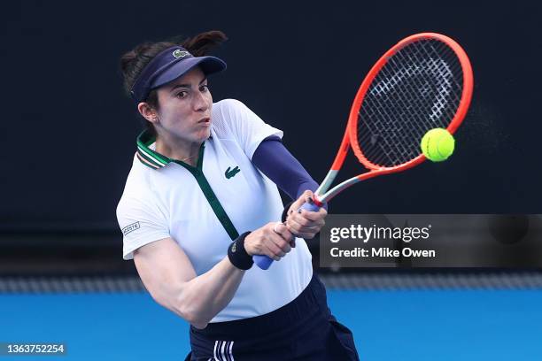 Christina McHale of the United States plays a backhand in her Woman's Singles match against Ellen Perez of Australia during day one of 2022...