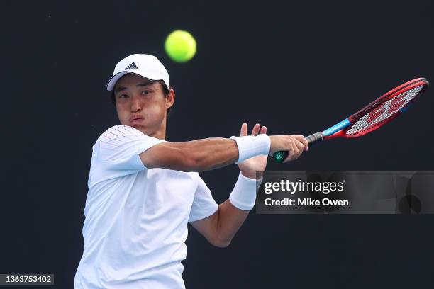 Go Soeda of Japan plays a forehand in his Men's Singles match against Frederico Ferreira Silva of Portugal during day one of 2022 Australian Open...