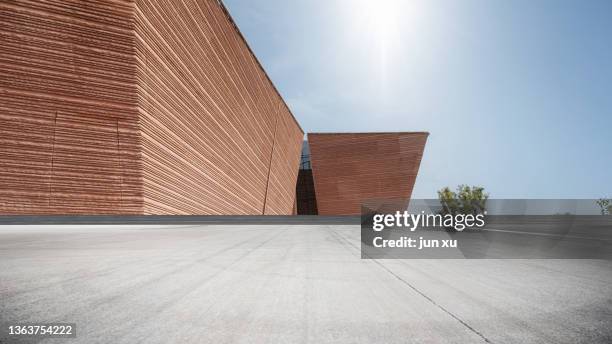 the external textured geometry of the building - building story fotografías e imágenes de stock