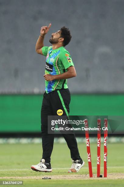 Haris Rauf of the Stars celebrates the dismissal of Harry Nielsen of the Strikers during the Men's Big Bash League match between the Melbourne Stars...
