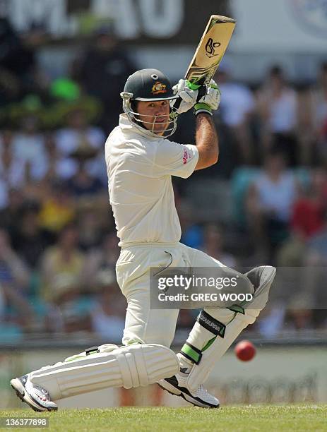 Australian batsman Ricky Ponting plays a cut shot to the boundary for four runs to bring up his 50 runs on day two of the second cricket Test against...