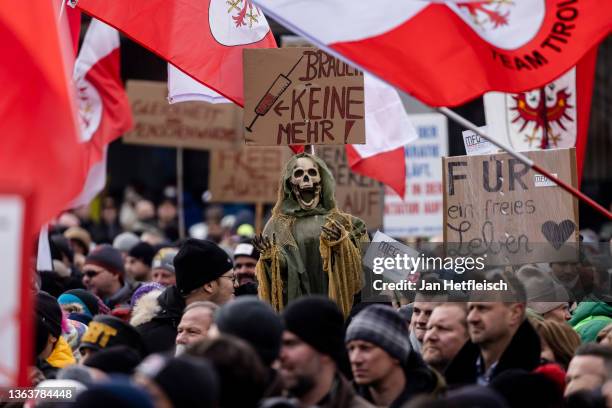 Protester carries a skeleton at a rally of people protesting against coronavirus-related restrictions and a coming vaccination mandate on January 09,...