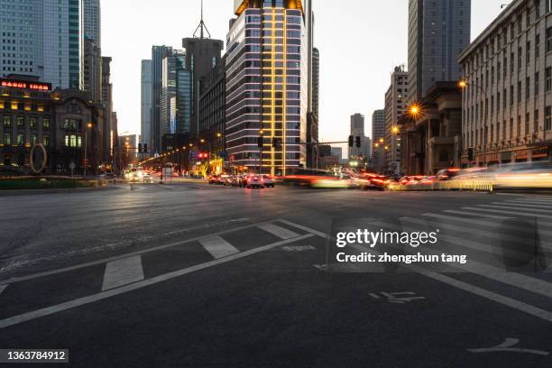 city street at dusk. - liaoning province stock pictures, royalty-free photos & images