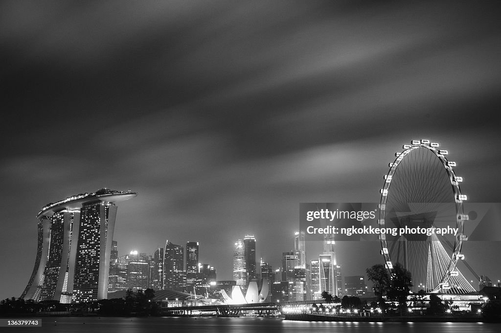 Skyline of Singapore with moving clouds