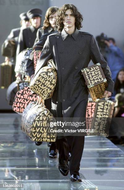 Model walks the runway during the Louis Vuitton Ready to Wear Spring/Summer 2001 fashion show as part of the Paris Fashion Week on October 12, 2000...