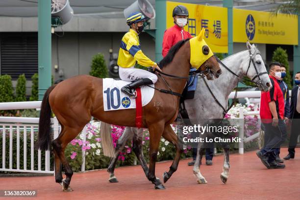 January 9 : Jockey Derek Leung Ka-chun riding Oriental Smoke during the Race 5 Pak Tam Chung Handicap at Sha Tin Racecourse on January 9, 2022 in...