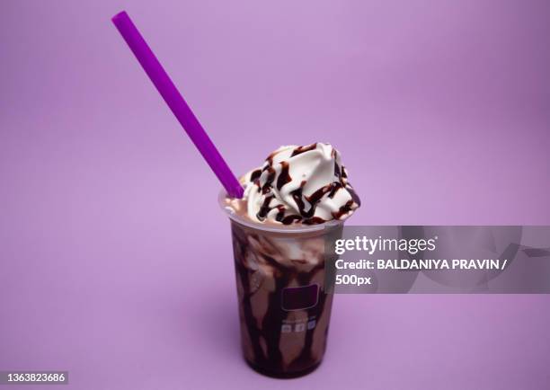 ice cream in glass with purple lighting background - café frappé fotografías e imágenes de stock