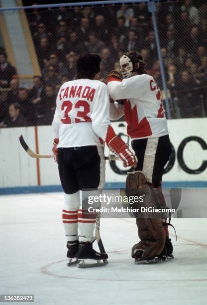 Serge Savard of Canada talks with goalie Ken Dryden during their game against the Soviet Union in the 1972 Summit Series at the Luzhniki Ice Palace...