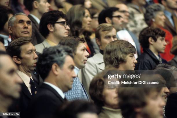 Stan Mikita and Bobby Orr of Canada sit in the stands during a game in the 1972 Summit Series between Canada and the Soviet Union at the Luzhniki Ice...
