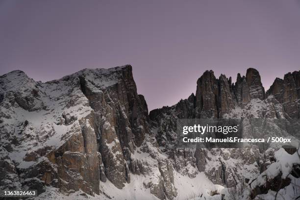 al crepuscolo,scenic view of snowcapped mountains against clear sky,lago di carezza,nova levante,bolzano,italy - crepuscolo stock pictures, royalty-free photos & images