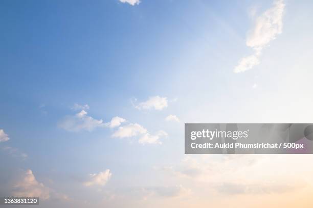 sky background and clouds,low angle view of sky during sunset - aukid stock-fotos und bilder