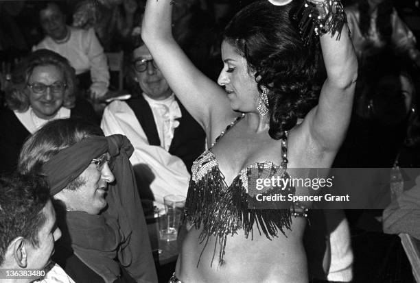 Belly dancer Nadina performs at fund-raiser, South End, Boston, Massachusetts, 1972.