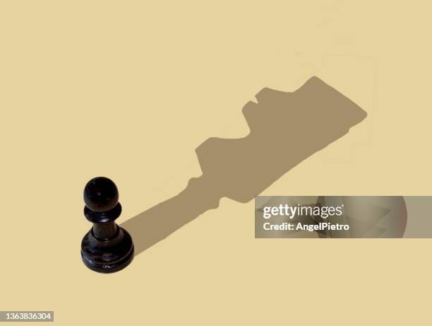 unexpected shadows in the chess game - chess icon stock pictures, royalty-free photos & images