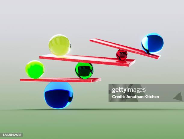 balanced glass balls - investment abstract stock pictures, royalty-free photos & images