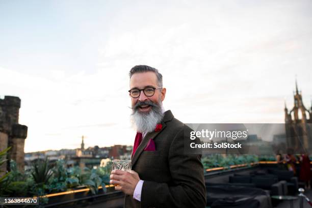 i'm on top of the world - men in suits drinking whiskey stock pictures, royalty-free photos & images