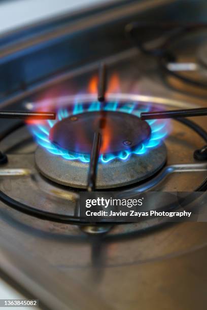 gas stove flame - gas flame stock-fotos und bilder