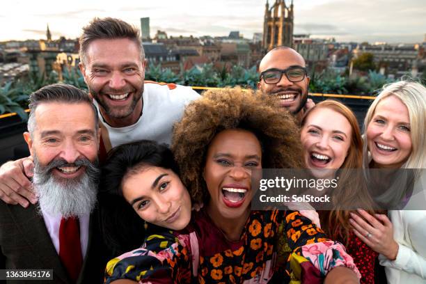 work party selfie - multiracial group of friends stock pictures, royalty-free photos & images