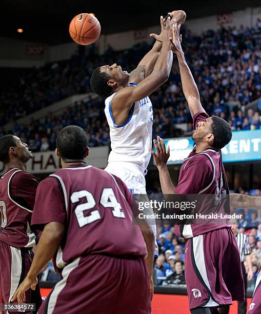 Arkansas-Little Rock's Michael Javes, right, fouls Kentucky's Terrence Jones amid Kentucky's 73-51 win in Freedom Hall on Tuesday, January 3 in...