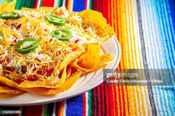 mexican food,close-up of pasta in plate on table,massachusetts,united states,usa - nachos - fotografias e filmes do acervo
