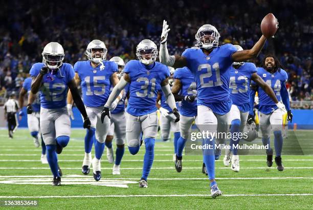 Tracy Walker III of the Detroit Lions celebrates after an interception against the Green Bay Packers during the fourth quarter at Ford Field on...