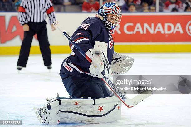 John Gibson of Team USA makes a blocker save on the puck during the 2012 World Junior Hockey Championship game against Team Finland at Rexall Place...