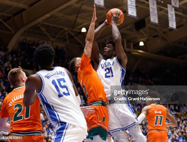 Griffin of the Duke Blue Devils shoots against Isaiah Wong of the Miami Hurricanes during their game at Cameron Indoor Stadium on January 08, 2022 in...