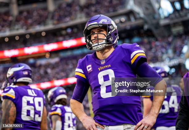 Kirk Cousins of the Minnesota Vikings stands on the sidelines in the third quarter of the game against the Chicago Bears at U.S. Bank Stadium on...