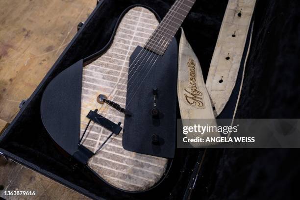 The "Mycocaster," a mycelium and paper guitar is seen in French luthier Rachel Rosenkrantz' studio on June 21 in Providence, Rhode Island. Leave...