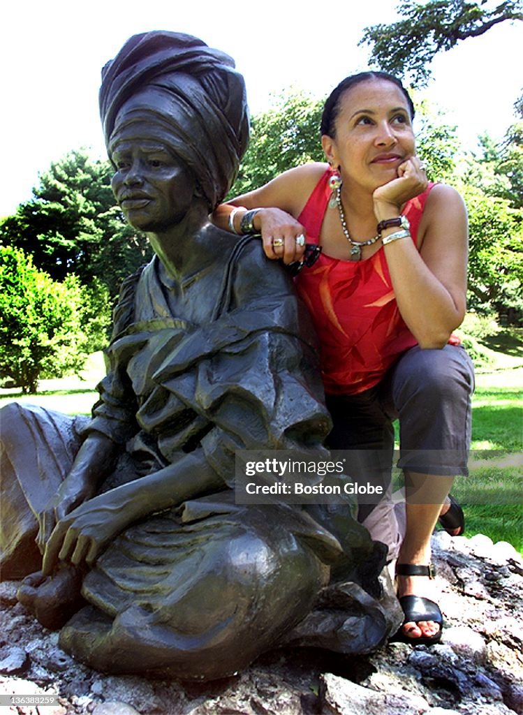 Sculptor Fern Cunningham With Her Work, "The Sentinel"