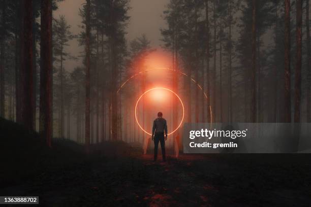 inert zombie standing in the forest at night - impossible bildbanksfoton och bilder