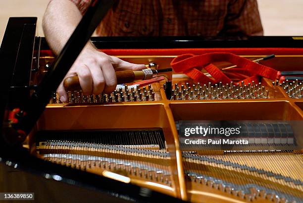 piano and piano tuner hands - tuning stock pictures, royalty-free photos & images