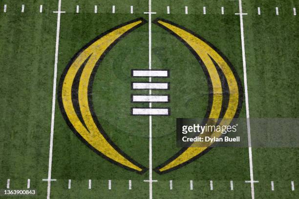 The 2022 CFP National Championship logo is seen on the field before the game between the Georgia Bulldogs and the Alabama Crimson Tide during the...
