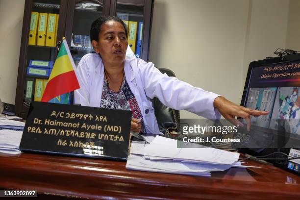 Hospital Administrator Dr. Haimanot Ayele briefs journalist on the damage and destruction done to the Dessie Referral Hospital by the TPLF during...