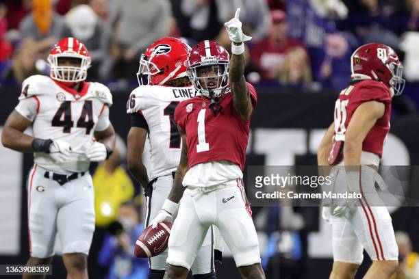 Jameson Williams of the Alabama Crimson Tide reacts in the first quarter of the game against the Georgia Bulldogs during the 2022 CFP National...