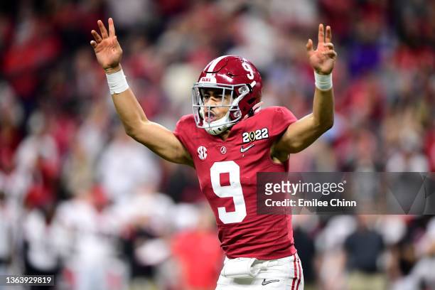 Bryce Young of the Alabama Crimson Tide reacts after a throwing a touchdown pass against the Georgia Bulldogs in the fourth quarter during the 2022...