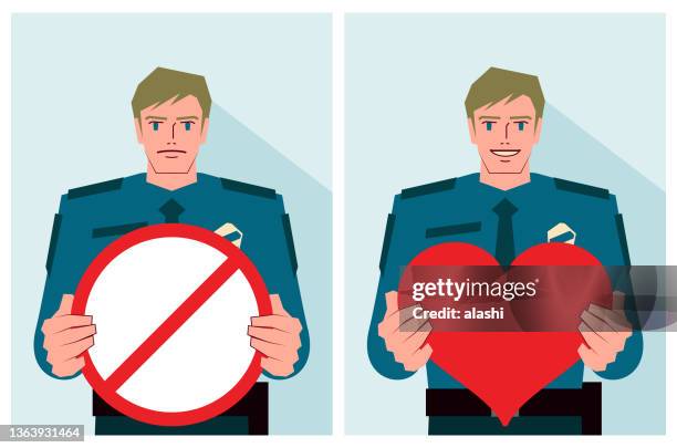 ein junger polizist hält ein herzformschild und ein verbotsschild in der hand - caucasian appearance stock-grafiken, -clipart, -cartoons und -symbole