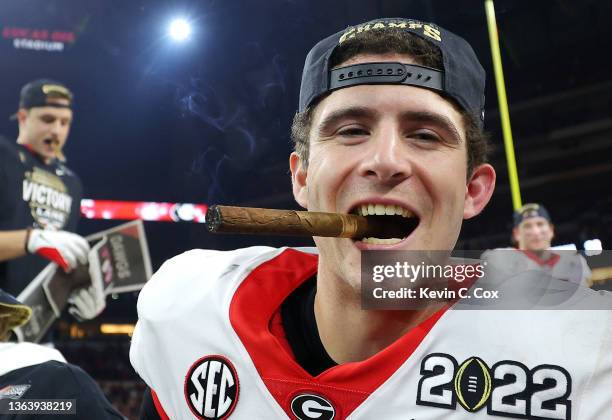 Stetson Bennett of the Georgia Bulldogs celebrates after the Georgia Bulldogs defeated the Alabama Crimson Tide 33-18 in the 2022 CFP National...