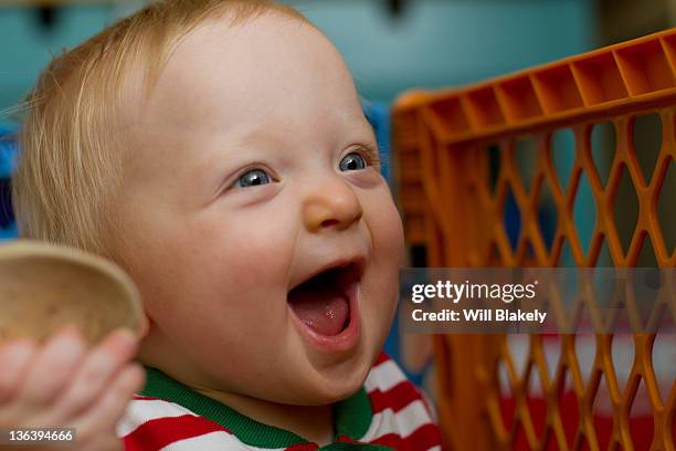 baby with spoon - wooden spoon stock pictures, royalty-free photos & images