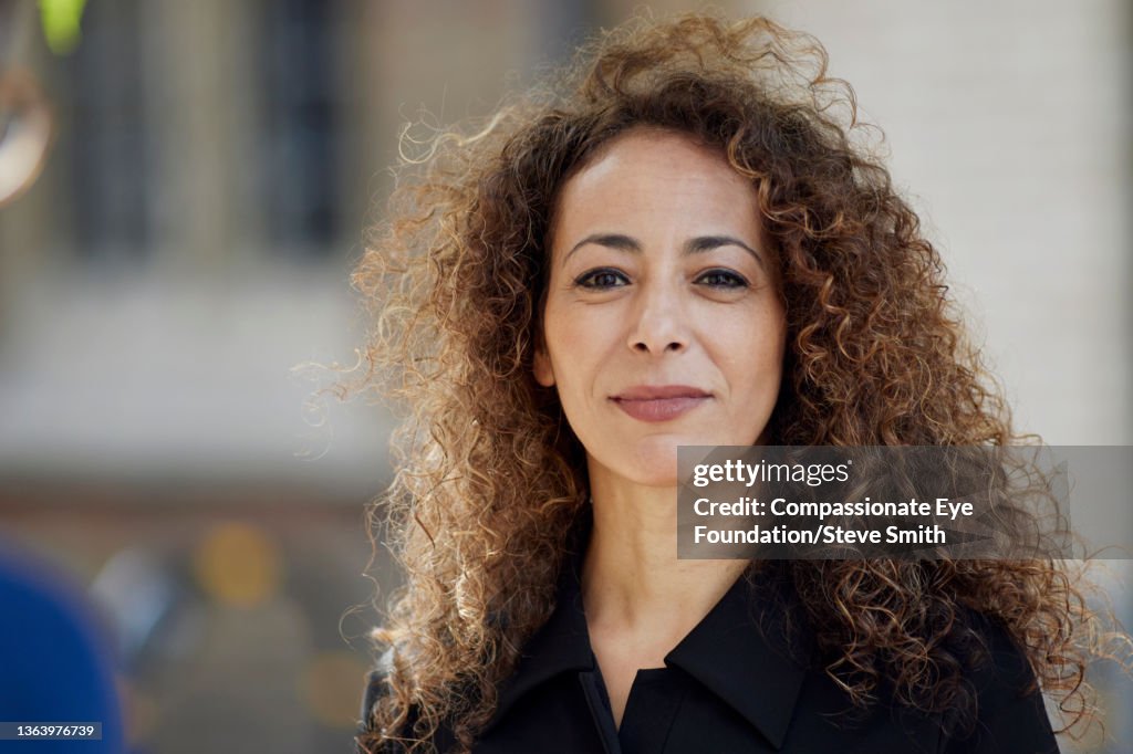 Portrait of businesswoman in city
