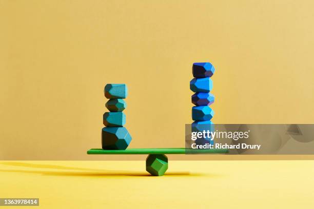conceptual image of geometric pebbles - juxtaposition stockfoto's en -beelden