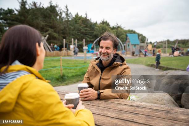 couple having a coffee break - cafe culture uk stock pictures, royalty-free photos & images