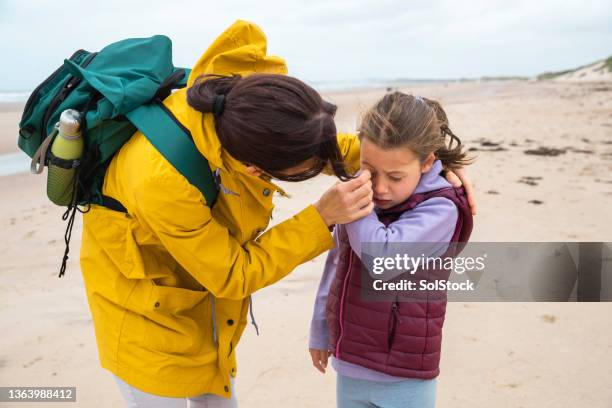 there's something in my eye - kid rubbing eyes stock pictures, royalty-free photos & images