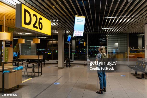 catching a connecting flight - schiphol airport the netherlands stock pictures, royalty-free photos & images