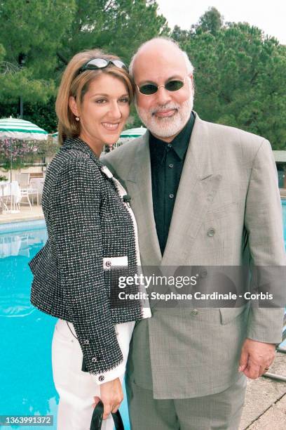 Celine Dion and Rene Angelil pose during a photocall prior"n the World Music Awards on May 7, 1996 in Monaco, Monaco.