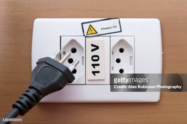 type n plug and 110 volt socket - plug socket stock pictures, royalty-free photos & images