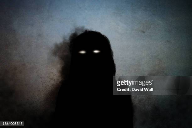 a horror concept. of a supernatural female demon with glowing eyes. with a texture edit. - spooky stock pictures, royalty-free photos & images