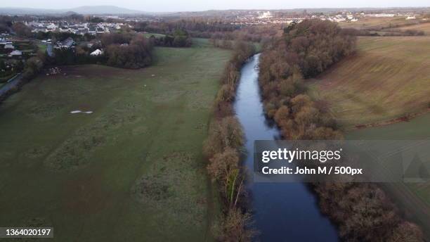 high angle view of river amidst trees against sky,county cork,ireland - ireland aerial stock pictures, royalty-free photos & images