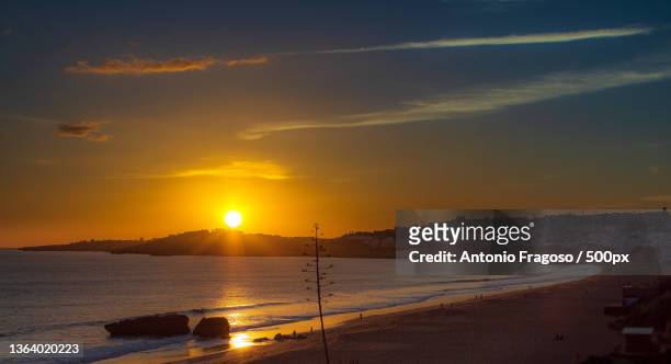 albufeira beachs,south portugal,scenic view of sea against sky during sunset,albufeira,portugal - albufeira stock pictures, royalty-free photos & images